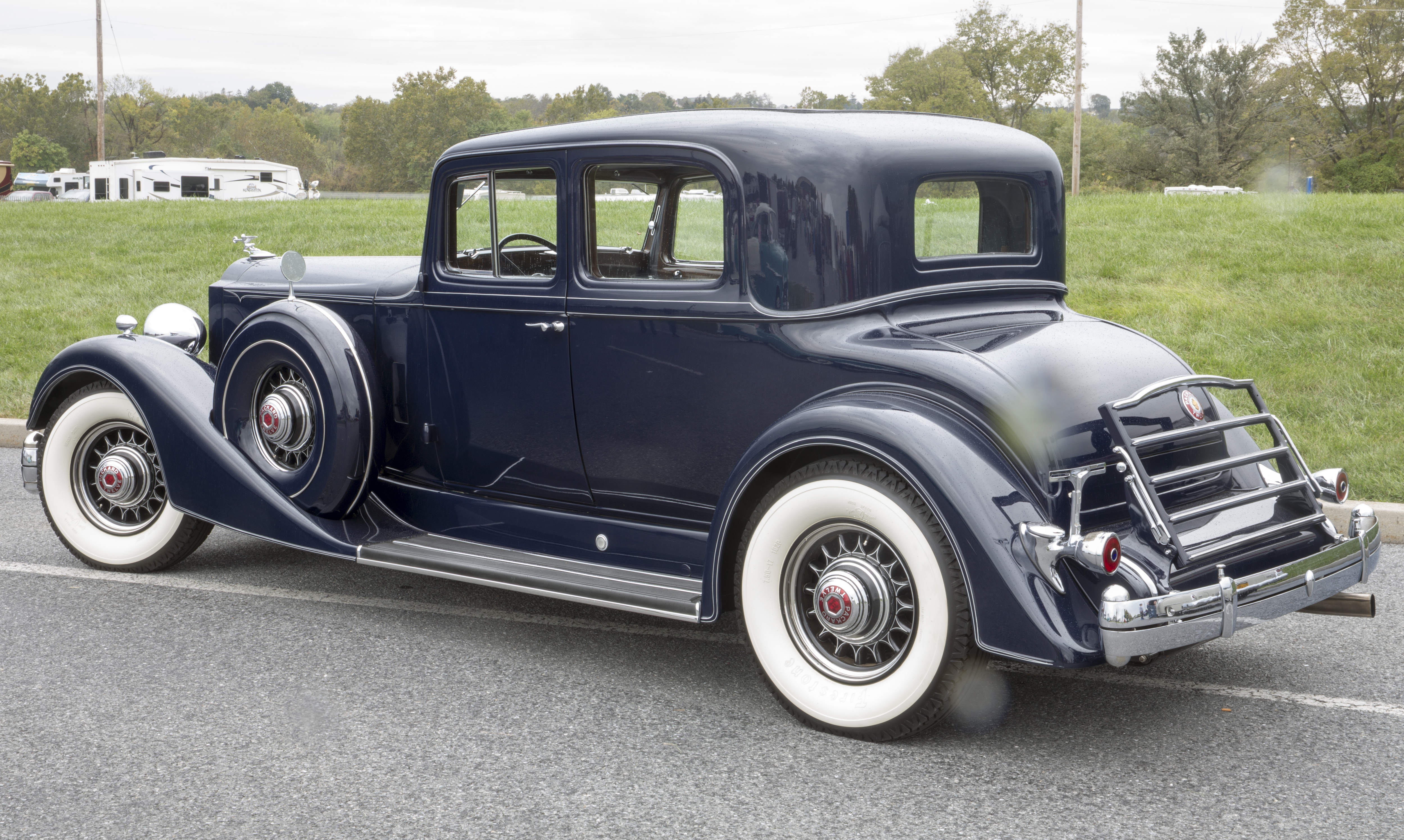 1934 Packard Twelve Five-Passenger Coupé (1107-737), chassis no. 737-22, original owner supposedly "Boss Tom" Pendergast, a political boss of Kansas City. Packard Blue w/ Blue cloth interior. Offered for sale at Hershey 2019. Too bad it was raining; I didn't realize that my lens had drops on it.